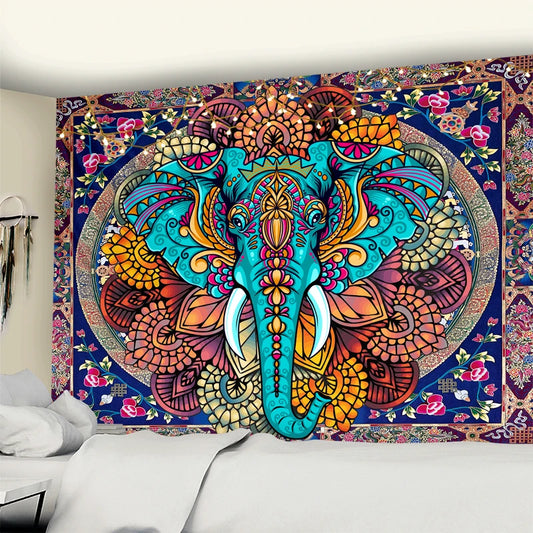A vibrant bohemian tapestry featuring a psychedelic turquoise elephant with mandala patterns, hanging on a wall above a white bed.